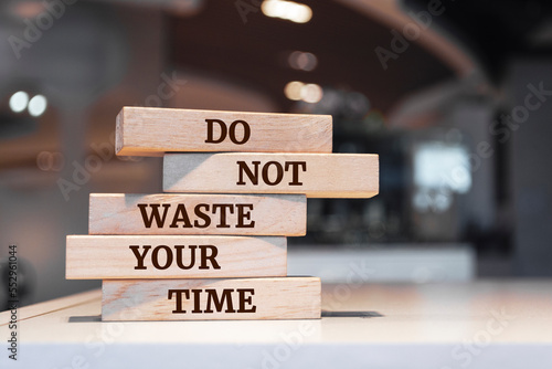 Wooden blocks with words 'Do not Waste Your Time'.