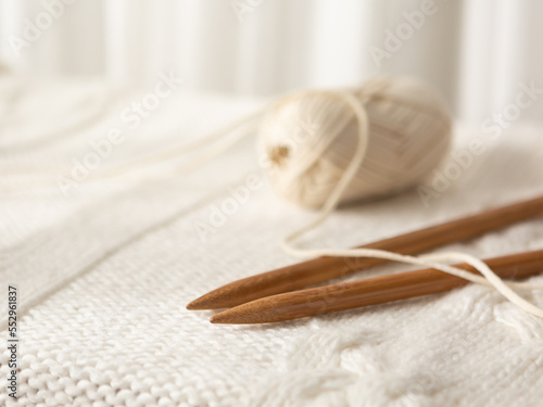 Knitted needle and knitted yarn