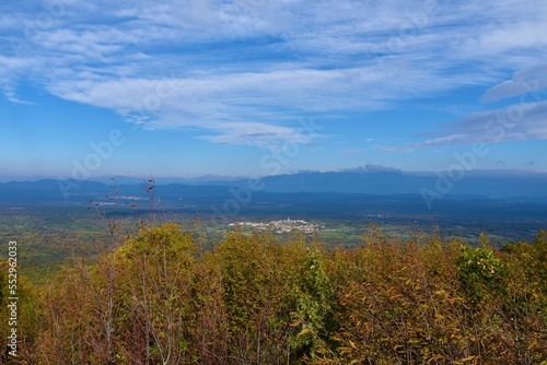 View of Karst plateau with Pliskovica village and Trnovo forest plateau behind in Primorska, Slovenia