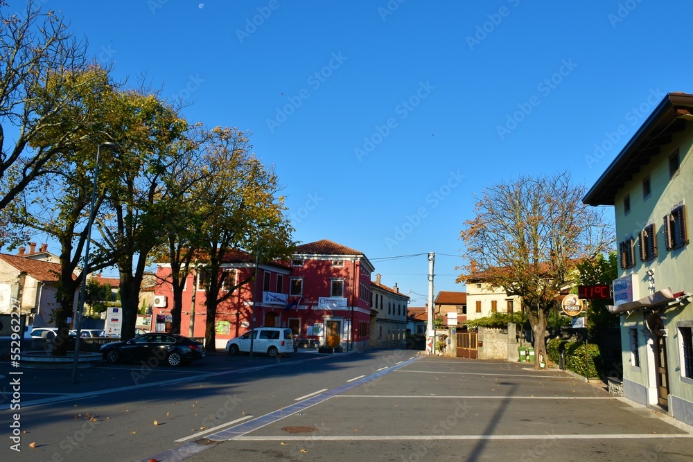 Fototapeta premium Dutovlje, Slovenia - November 13 2022: Center of Dutovlje village at Karst in Primorska, Slovenia