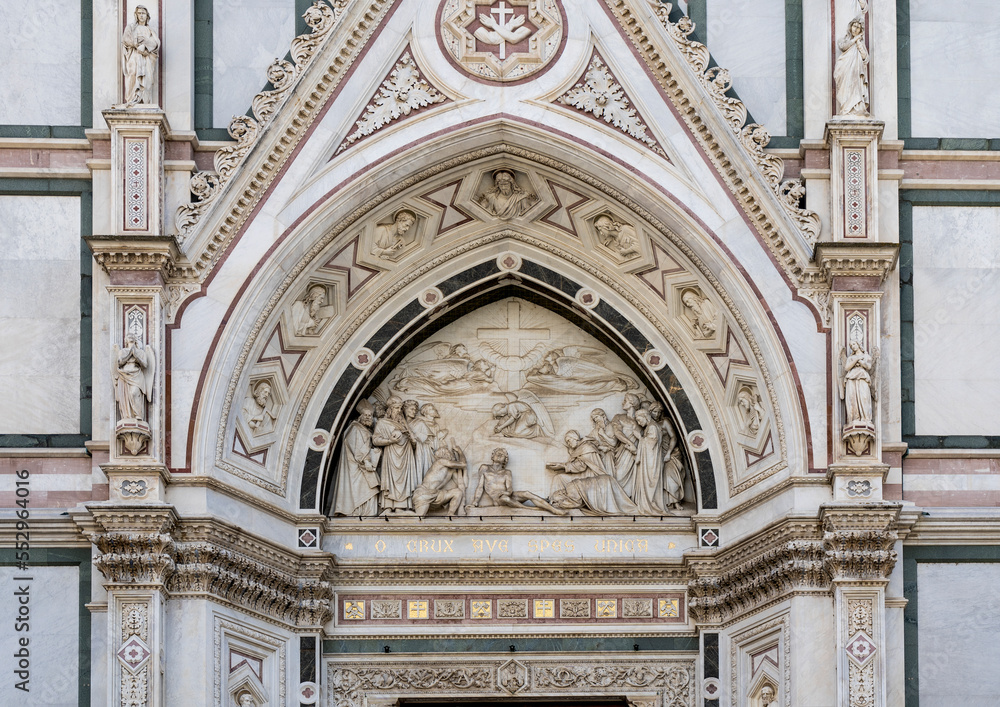 Marble lunette depicting the Triumph of the cross, by sculptor Giovanni Duprè, above the central door, façade of the Franciscan Basilica of Santa Croce, Florence city center, Tuscany region, Italy