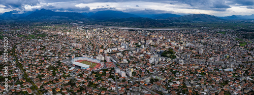 Aerial view of the city Shkodër in albania on a sunny day in autumn.	 photo