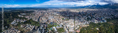 Aerial view around the city Tirana in Albania on a cloudy day in autumn. 