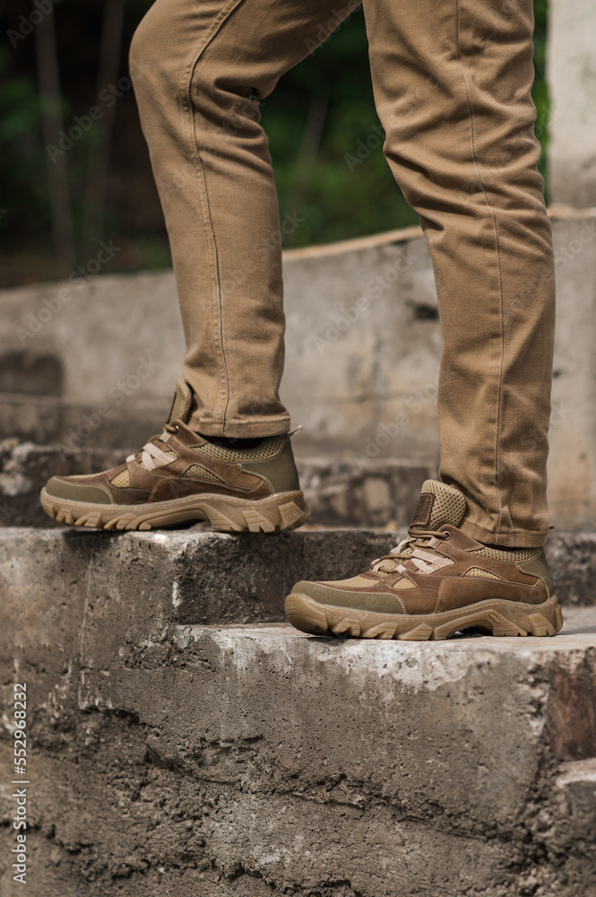 Tactical beige sneakers. Trekking shoes with a rough sole