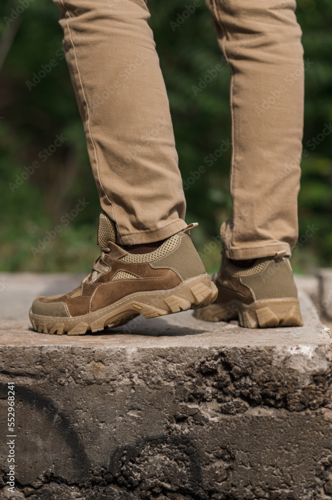 Tactical beige sneakers. Trekking shoes with a rough sole Tactical beige sneakers. Trekking shoes with a rough sole
