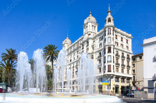 Fountain and colonial palace in Alicante, Spain