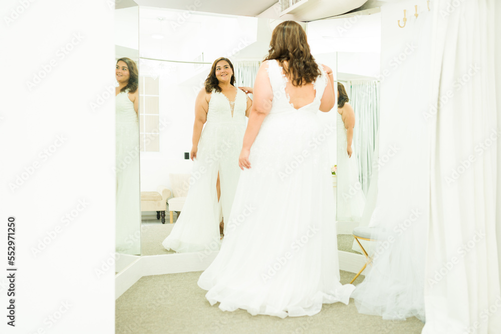 Beautiful overweight woman wearing a wedding gown Beautiful overweight woman wearing a wedding gown