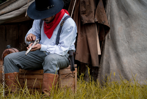 cowboy with gun.portrait cowboy cowboy with gun prepares to gun fight.