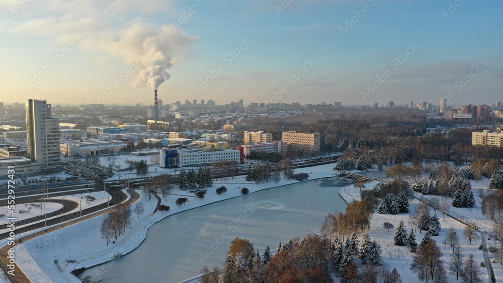 Obraz premium Panoramic view of the eastern outskirts of Minsk, the capital of Belarus. Minsk in the snow in winter. Eastern Europe in winter. Architecture of Minsk.