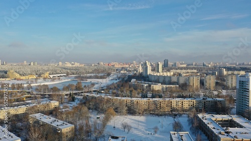 Vostok microdistrict in Minsk in winter. Sleeping areas of the capital of Belarus in the snow. Snow-covered Minsk in winter. Aerial photography of Minsk from above. Eastern Europe.