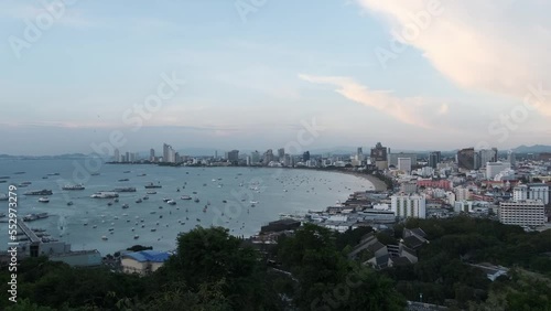 Thailand pattaya city view from hill. Cityscape under bluy cloudy sky.