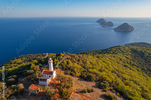 Fototapeta Naklejka Na Ścianę i Meble -  Gelidonya lighthouse Lycian Way in Antalya, Turkey Aerial top view. Concept beautiful summer landscape at sunset from drone