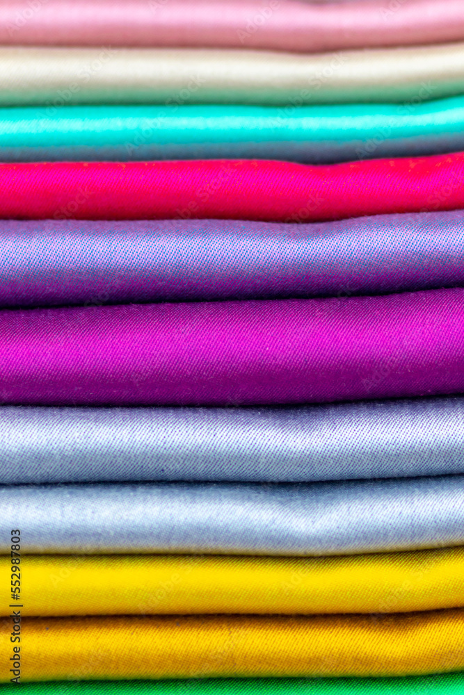 Silk cloth in rainbow colors shining in the sunlight Silk cloth in rainbow colors shining in the sunlight
