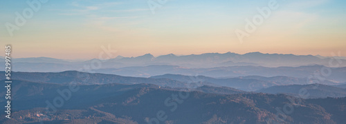 View to Mala Fatra mountains from Lysa hora hill in Moravskoslezske Beskydy mountains in Czech republic photo