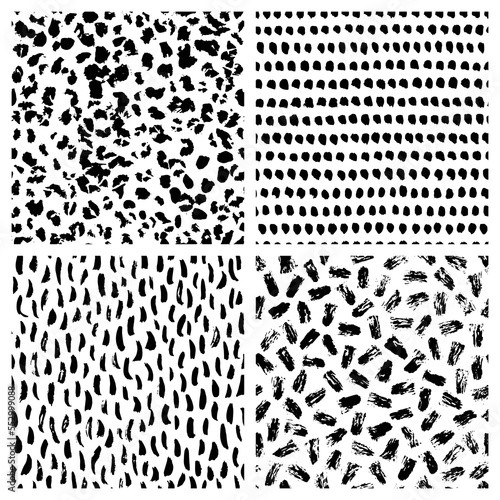 Set of black and white abstract hand drawn seamless patterns