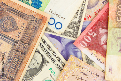 Background from different money banknotes from all over the world