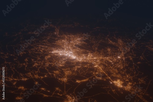 Aerial shot of Tbilisi (Georgia) at night, view from south. Imitation of satellite view on modern city with street lights and glow effect. 3d render