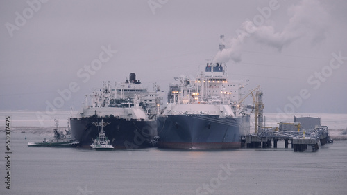 Floating storage and regasification unit and liquified natural gas carrier in the port during the ship-to-ship operations