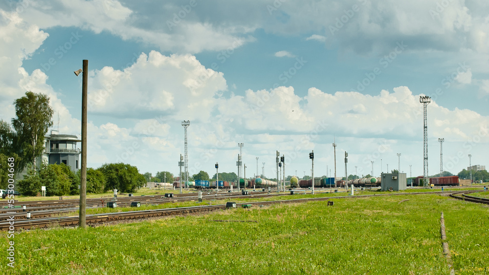 RIGA, LATVIA-JULY 2, 2022: railway, in the photo a large marshalling yard, railway wagons,railway tanks, semaphores and tracks
