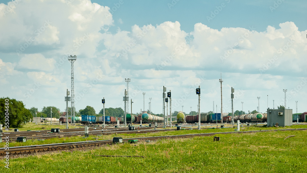 RIGA, LATVIA-JULY 2, 2022: railway, in the photo a large marshalling yard, railway wagons,railway tanks, semaphores and tracks