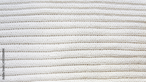 фотографія White knitted texture of woolen wool