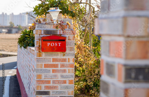 Mail Box In front of a House