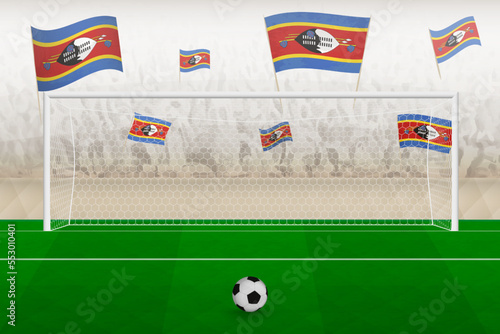 Swaziland football team fans with flags of Swaziland cheering on stadium, penalty kick concept in a soccer match.