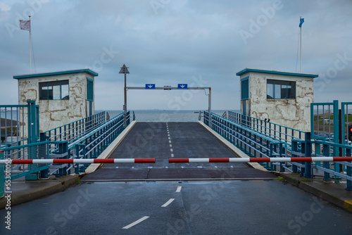 barriers for the asphalt road with access to the ferry