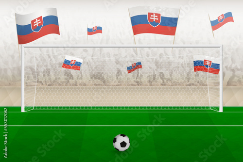 Slovakia football team fans with flags of Slovakia cheering on stadium, penalty kick concept in a soccer match.