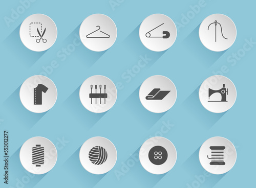 sewing vector icons on round puffy paper circles with transparent shadows on blue background. sewing stock vector icons for web, mobile and user interface design