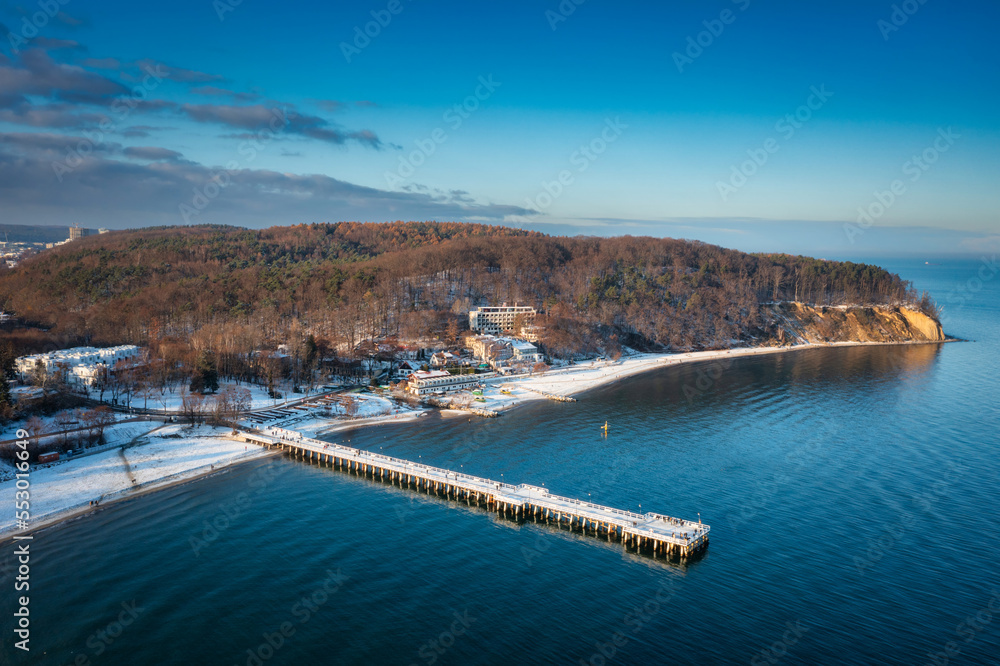 Beautiful landscape with wooden pier in Gdynia Orlowo in winter scenery, Poland Beautiful landscape with wooden pier in Gdynia Orlowo in winter scenery, Poland