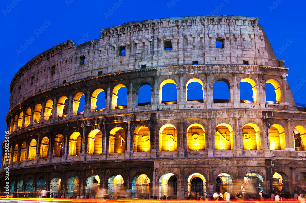 The colosseum at night with moving lights