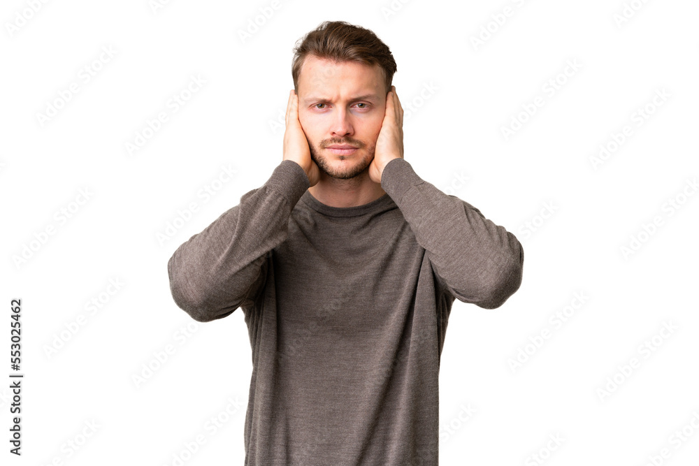 Young handsome caucasian man over isolated chroma key background frustrated and covering ears Young handsome caucasian man over isolated chroma key background frustrated and covering ears