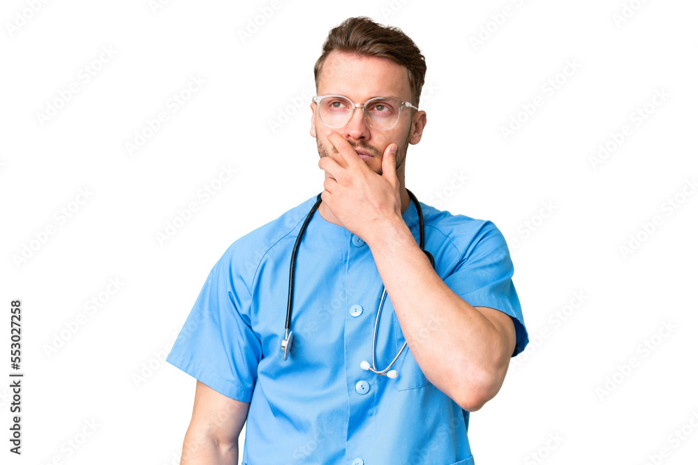 Young nurse man over isolated chroma key background having doubts and with confuse face expression Young nurse man over isolated chroma key background having doubts and with confuse face expression