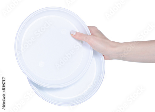 Disposable plastic dishes in hand on white background isolation
