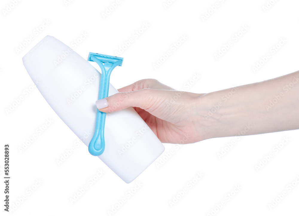 White beauty bottle shampoo shower gel with razor in hand on white background isolation White beauty bottle shampoo shower gel with razor in hand on white background isolation