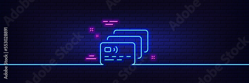 Neon light glow effect. Credit card line icon. Bank money payment sign. Non-cash pay symbol. 3d line neon glow icon. Brick wall banner. Card outline. Vector