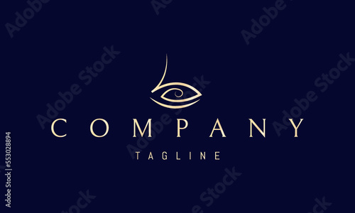 Vector golden logo on which an abstract image of the symbol of the god Ra in the form of an eye.