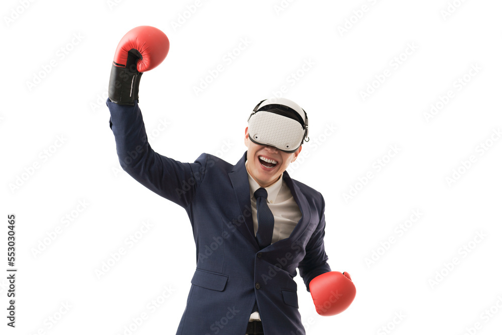Virtual reality concept with young businessman wearing boxing glove and VR glasses on his head show exciting expression isolated over white background Virtual reality concept with young businessman wearing boxing glove and VR glasses on his head show exciting expression isolated over white background