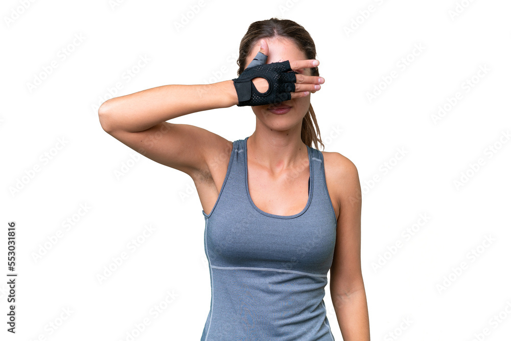 pretty Sport Uruguayan woman over isolated background covering eyes by hands. Do not want to see something
