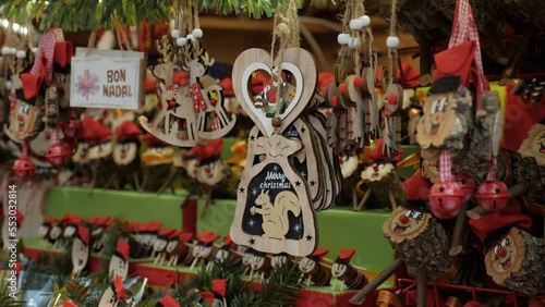 Decoration on the door, house - Santa Claus. Christmas Fair market, New Year's decoration close-up, people shoppers in the background