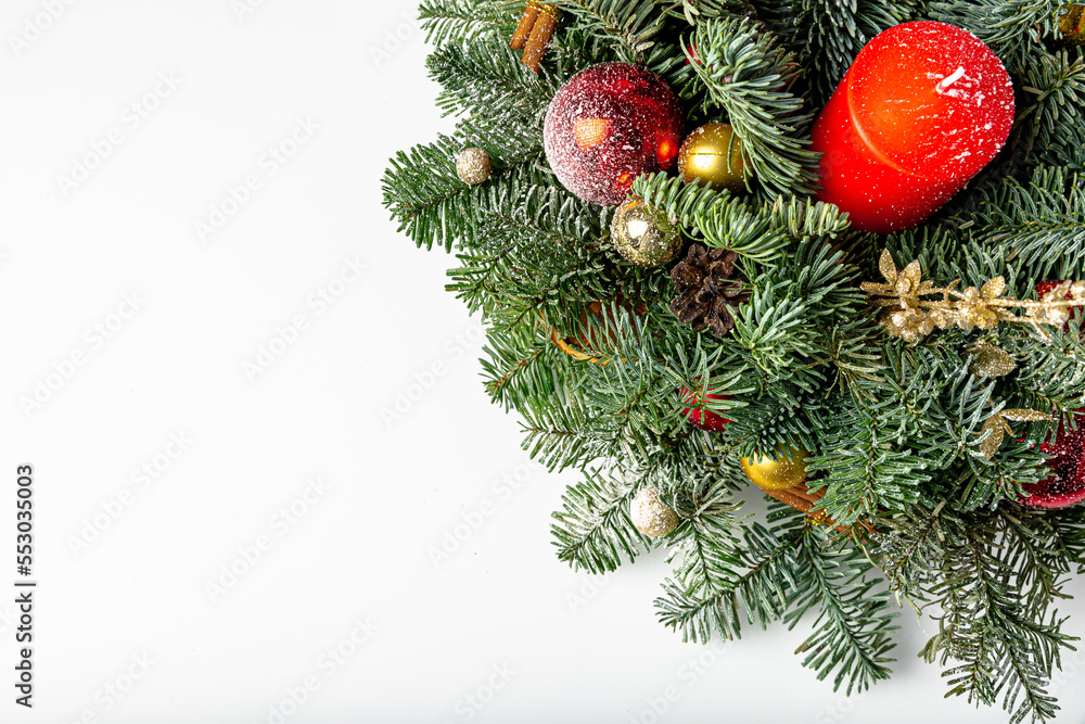 Merry Christmas and Happy Holidays greeting card, frame, banner. New Year. Noel. Christmas red ornaments and gift on light white background top view. Winter xmas holiday theme. Flat lay. Copy space Merry Christmas and Happy Holidays greeting card, frame, banner. New Year. Noel. Christmas red ornaments and gift on light white background top view. Winter xmas holiday theme. Flat lay. Copy space