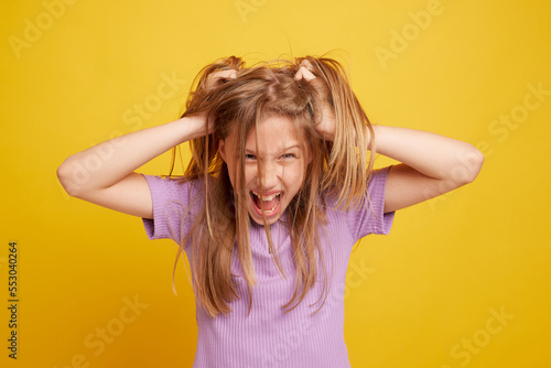 Valokuva Playful young girl grimacing at camera close-up horizontal website header banner