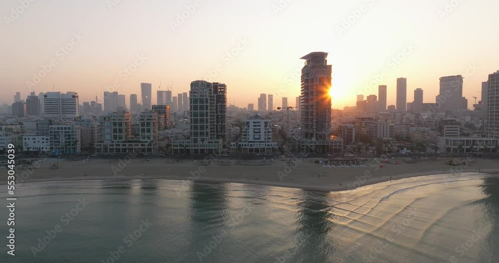 Tel Aviv coastline at sunrise with beautiful calm waters of The Mediterranean Sea, Aerial view Tel Aviv coastline at sunrise with beautiful calm waters of The Mediterranean Sea, Aerial view