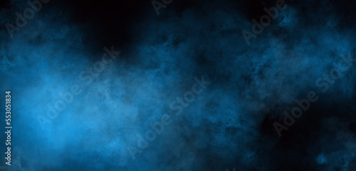 A digital illustration of an abstract background of blue smoke.