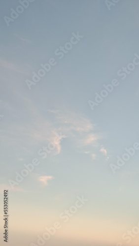 Evening sky before sunset. Clouds in the sky. Pastel colors. Background. Textures. Abstract background. Copy spase.