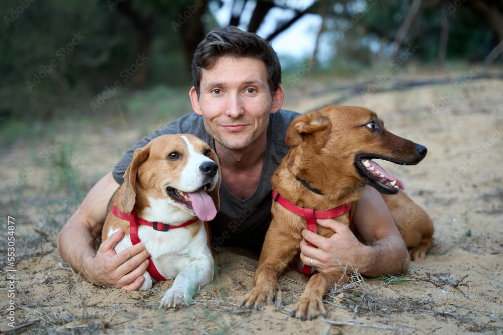 A handsome man with his lovely dog