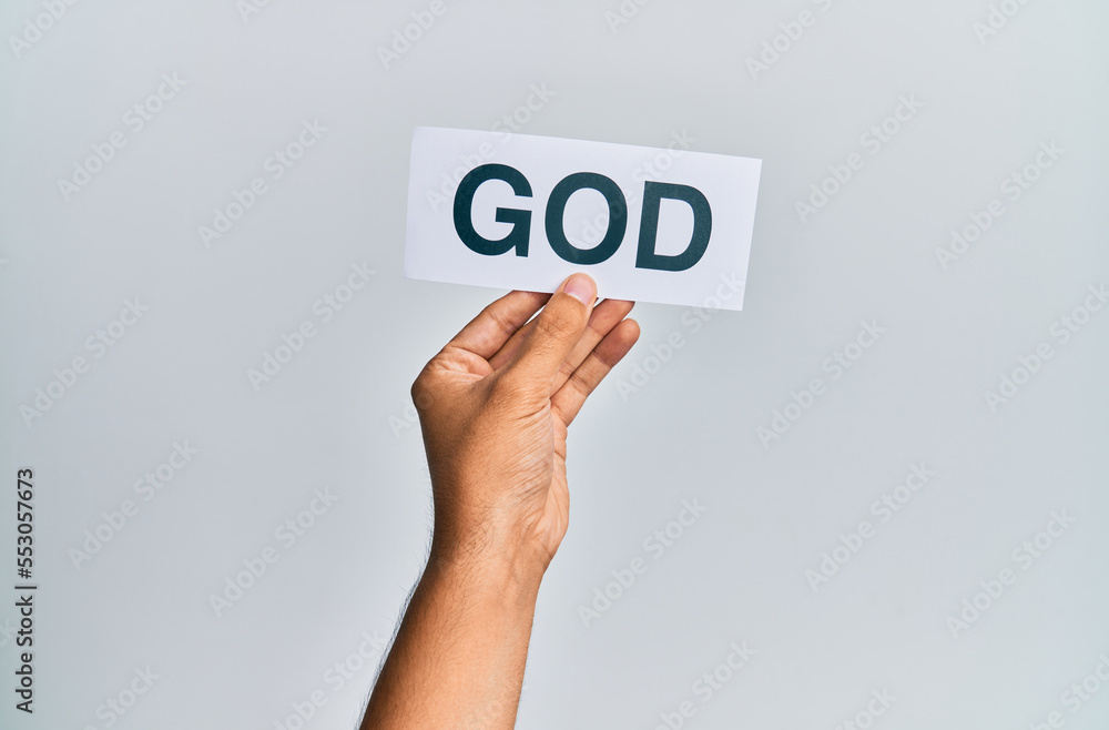 Hand of caucasian man holding paper with god word over isolated white background Hand of caucasian man holding paper with god word over isolated white background