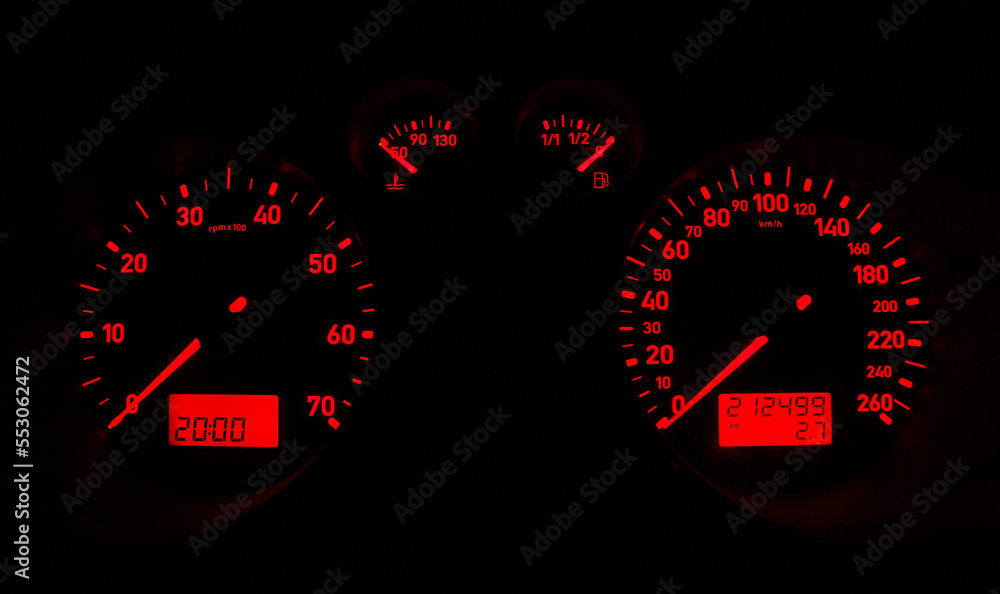 Car dashboard glowing a red light