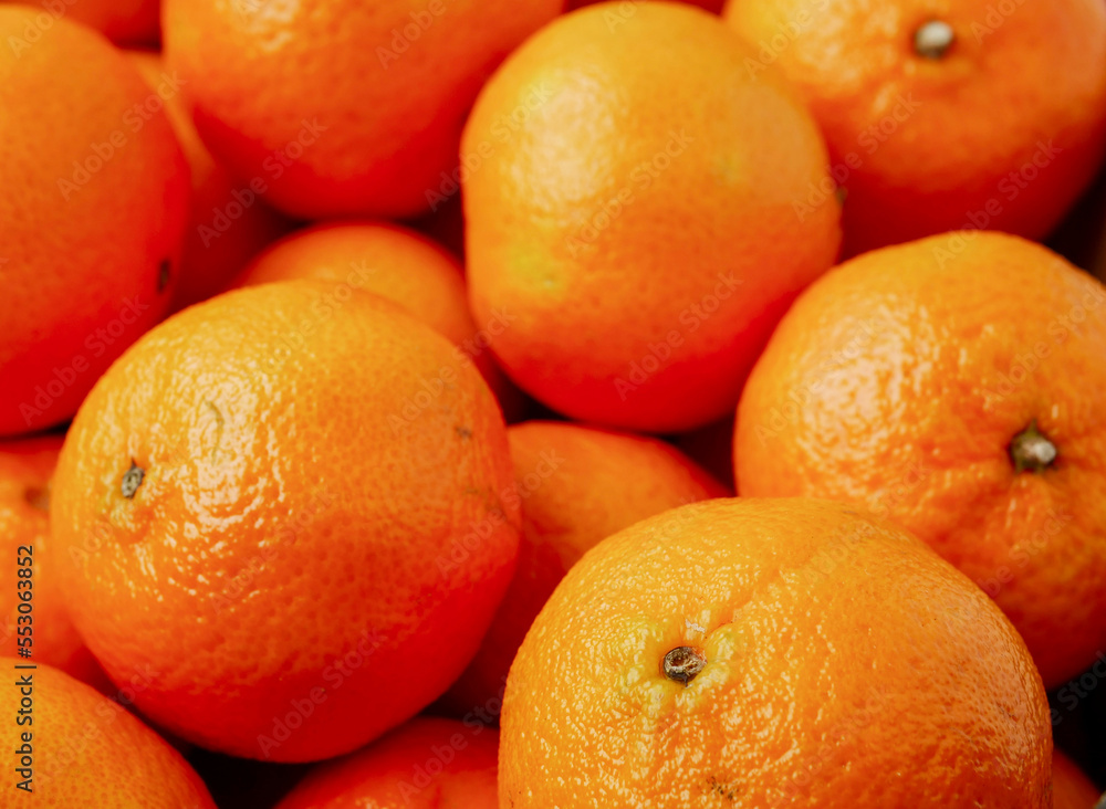 Close up of pile of juicy fresh mandarins or tangerine. Close up of pile of juicy fresh mandarins or tangerine.
